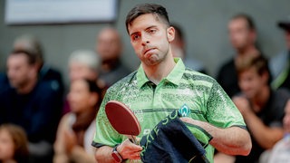 Werders Tischtennis-Profi Marcelo Aguirre schaut frustriert nach einem Match.