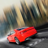 Ein rotes Rennauto.