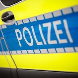 Polizei Aufschrift an einem Wagen