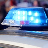Blaulicht an einem Polizeiwagen.