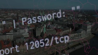 Eine Fotomontage aus einem Luftbild von Bremen und dem Text eines Computers
