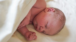Ein neugeborenes Baby