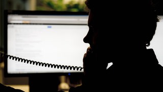 Mann am Telefon