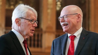 Reinhard Rauball von der DFL und Innensenator Ulrich Mäurer