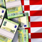 Geldbündel liegen auf der Bremer Speckflagge (Symbolbild)