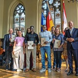 Einbürgerungsfeier in der oberen Rathaushalle mit Bürgermeister Bovenschulte, Olaf Scholz und den Neubürgern
