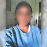 Verpixeltes Fahndungsfoto einer tatverdächtigen Geldwäscherin.