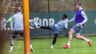 Plogmann, Assale und Mai im Training.