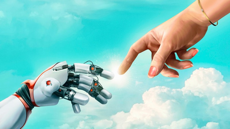 Der Zeigefinger einer Roboterhand berührt die Hand eines Menschen.