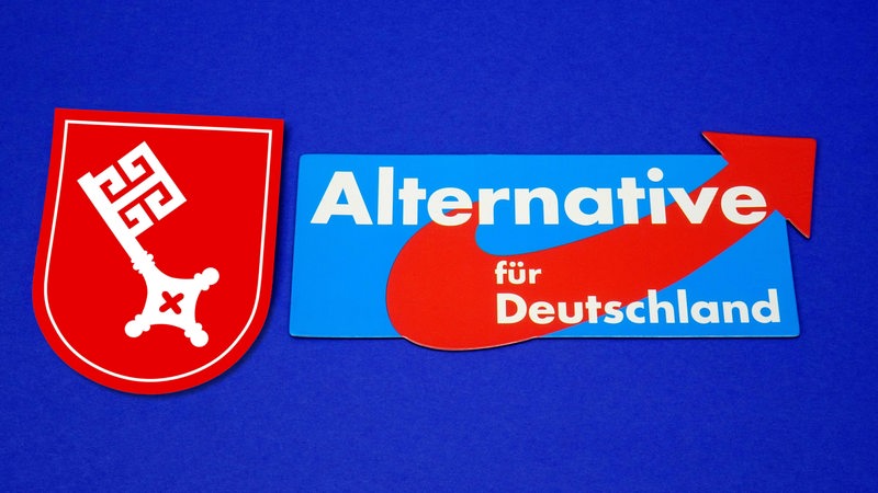 Das Logo der AfD und das fei verwendbare Wappenzeichen Bremerns liegen auf einem blauen Tuch.
