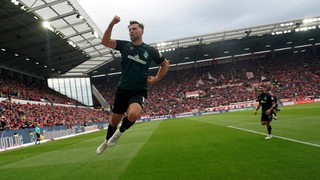 Werder-Stürmer Niclas Füllkrug bejubelt seinen Ausgleichstreffer gegen Mainz.