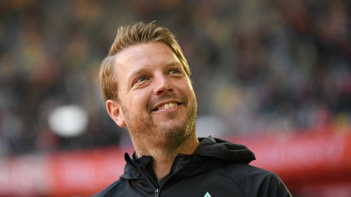 Florian Kohfeldt lächelt.