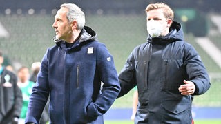 Die Trainer Adi Hütter und Florian Kohfeldt haben nach dem Spiel noch leichte Animositäten miteinander.