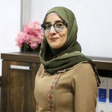 Hannah M. Ataya lächelt in der jordanischen Pflegekammer.
