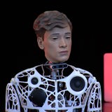 Ein Roboter mit einem menschenähnlichen "Gesicht" blickt zur Seite