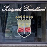 Das Logo des "Königreich Deutschland" prangt am Fenster eines Pförtnerhauses in Lutherstadt Wittenberg (Sachsen-Anhalt).