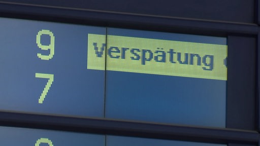 Leuchtendes Schild mit dem Wort "Verspätung"