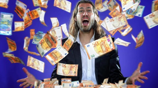 Ein Mann steht im Geldregen und schreit. (Symbolbild)