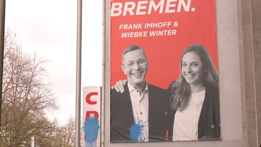 Ein CDU-Plakat auf dem Frank Imhoff und Wiebke Winter abgebildet sind