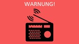 Ein Radio mit Antenne und der Schriftzug "Warnung" vor rotem Hintergrund