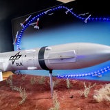 Ein Modell des Reusability Flight Experiment (ReFEx) ist im Foyer des Instituts für Raumfahrtsysteme des Deutschen Zentrums für Luft- und Raumfahrt (DLR) ausgestellt