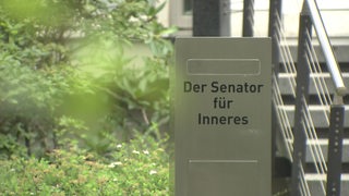 Schild auf dem steht "der Senator für Inneres"