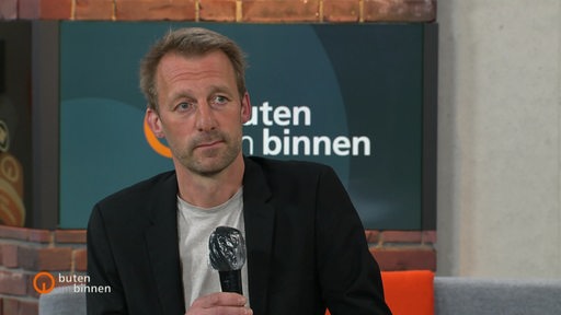 Talkgast Thomas Köcher im Interview von buten un binnen.