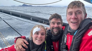 Selfie mit Rosalin Kuiper, Boris Herrmann und Will Harris vor dem Kap Horn