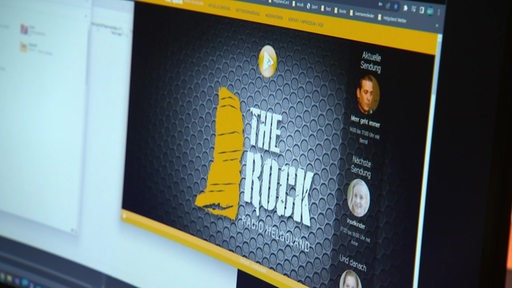 Das mit künstlicher Intelligenz The Rock Radio Helgoland auf einem Computer Bildschirm. 