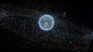 Ein Bild von der Erde im Weltall umgeben von sehr viel Weltraummüll. 