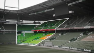 Eine Aufnahme aus dem Weserstadion, auf der ein Tribuenenbereich farblich hervorgehoben ist. 