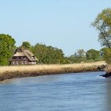 Fachwerkhaus an der Wümme in der Landschaft des Blockland