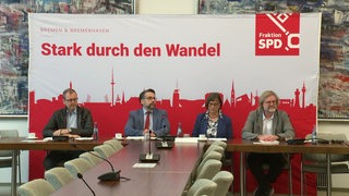 SPD-Abgeordnete an einem Tisch